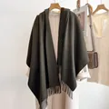 Classic dark olive green wool scarf with fringe tassels shown on a beige coat - 185cm / Dark Green