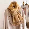 Classic camel wool scarf with fringe tassels styled on a beige coat for autumn - 185cm / Camel