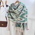 Green cashmere-like shawl featuring geometric wave patterns and fringe tassels - Green