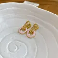 Eleganti orecchini in oro e rosa con pietre occhio di gatto e strass luccicanti - 48# Orecchini ad Anello in Smalto Rosa con Strass Oro Cavi