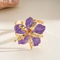Elegant purple enamel flower open cuff bracelet with a golden metallic finish and texture - Bangle / Purple