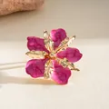 Elegant pink drip oil flower ring with gold metallic accents and marble texture - Ring / Rose Red