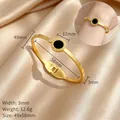 Detailweergave van de gouden roestvrijstalen armband met Romeinse cijfers en zirkonia - S303 Goud [titaniumstaal]