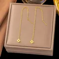 Elegant gold clover tassel earrings with delicate drop chain and hollow floral design - Round Clover(G367)