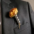 Creative silver spiral flower brooch holding a dried yellow rose on a suit lapel - Spiral Bouquet Brooch Style (1466) / Silver