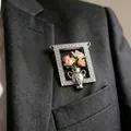Vintage style silver-tone frame brooch featuring a miniature flower bouquet design - Vintage Photo Frame Vase Style (2712) / Silver