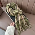 Detail of classic plaid pattern scarf with soft tassels and green beige check texture - Green