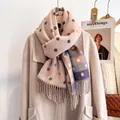 Close-up of soft beige scarf with colorful polka dots and fine fringe details - Multicolor Dots - Pink