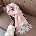 Thick plaid winter scarf with pink and lavender tassel design on a leather sofa display - 188CM / Pink