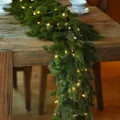 Artificial Christmas garland with warm LED lights on a rustic dark wood surface - Green Style (A) With LED