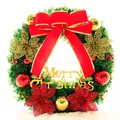 Detailed view of green Christmas wreath with red bows and Merry Christmas signage - 30CM Simplified Four Flowers Wreath