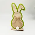 Easter bunny wooden ornament with green accent, jute bow and white pom-pom tail on base - Rabbit with Green Border and Furry Tail (Style 6)