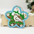 Blue flower-shaped wooden cutout ornament featuring a white bird on a green branch - Blue Flower Frame White Bird