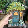 Solar powered resin fairy house garden statue with leaf roof and Welcome sign decoration - Colorful