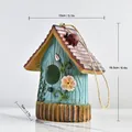 Blue resin birdhouse with red roof and floral details for garden decor, size 16.5cm - 13x7x16.5cm / Blue Birdhouse