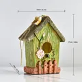 Garden birdhouse ornament in green resin with wood texture and flower details, 17cm height - 13x7x17cm / Green Birdhouse
