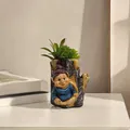 Garden resin gnome tree stump planter with a purple hat elf and succulent plant - Tree Stump Gnome Flower Pot