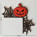 Halloween wooden door corner decoration with orange pumpkin and black spider webs - Spiderweb Pumpkin Style