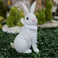 White woven resin rabbit statue with a silk bow tie for Easter garden decoration - White Sitting Pose