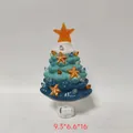Detailed view of ocean-themed resin starfish Christmas tree night light with plug base - Plug-in Night Light / Straight-in Style