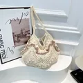 Cream crochet knit shoulder bag with lilac ruffled edges and hollow mesh texture - With Pendant / Pink