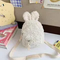 White sherpa mini backpack for kids featuring cute plush bunny ears and double zippers - White