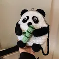 Handmade crochet panda shoulder bag with green bamboo decor and metal clasp - Black