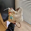 Cream crochet bucket bag with brown leather strap and pearl handle for beach vacations - Small / Without Pendant / Beige