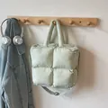 Lightweight mint green quilted puffy tote bag with adjustable shoulder strap - Green
