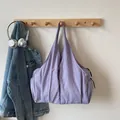 Purple pleated nylon shoulder tote bag with side pockets in a minimalist casual style - Purple