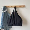 Classic black pleated tote bag in oversized nylon for casual travel and daily wear - Black