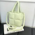 Quilted light green puffer tote bag with soft padded handles and crossbody strap - Green