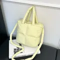 Light yellow quilted down puffer bag with top handles and adjustable shoulder strap - Yellow