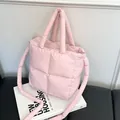 Light pink puffy quilted shoulder bag with soft nylon finish and shoulder strap - Pink