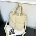 Puffy quilted down tote bag in cream beige with soft padded handles and crossbody strap - Khaki