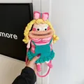 Handmade crochet cartoon girl crossbody bag with pink bow and green ruffled dress - Pink