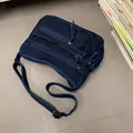Borsa a tracolla vintage in denim blu scuro con tasche multiple e cinghia - Blu scuro