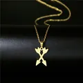 Minimalist gold stainless steel necklace with crossed arrows pendant on black background - Crossed Arrows Style (106)