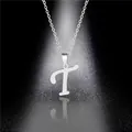 Close-up of polished silver stainless steel T-letter pendant necklace on black background - Letter T