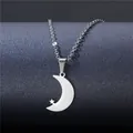 Minimalist silver moon and star pendant necklace on a dark textured display stand - Crescent Moon Pentagram Style (XL44)