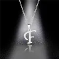 Polished silver stainless steel necklace featuring a minimalist capital letter F pendant - Letter F