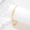Detailed shot of infinity symbol on a gold stainless steel chain with adjustable length - Infinity Symbol Style (SLJ78)