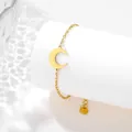 Close-up of golden crescent moon bracelet with heart charm on white podium - Crescent Moon Style (SLJ76)