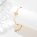 Detail of gold stainless steel star bracelet with hexagonal charm on white stand - Hexagram Style (SLJ77)