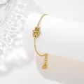 Detail of a gold Hamsa Hand bracelet on a white pillar with water ripple lighting - Hamsa Hand Style (SLJ60)