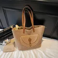 Large straw beach tote in natural beige with brown leather handles and front flap pocket - Khaki