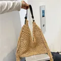 Beige cotton woven tote bag with fringe details and black leather handle straps - Khaki