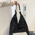 Black hollow crochet woven shoulder bag with long fringes and adjustable strap - Black