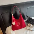 Large red canvas tote bag with white embroidery and decorative rope tassel detail - Red