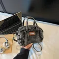 Retro charcoal denim bowling bag with leather accents and slim crossbody strap - Dark Brown